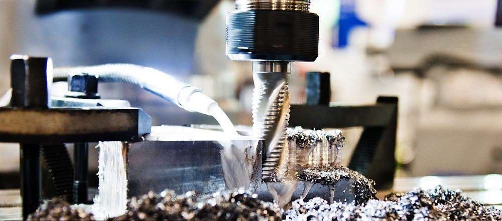 Mashiinka CNC ee qaybaha birta aan lahayn