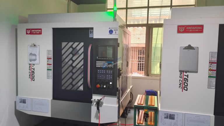 CNC machining grinding service finishing a hardened steel shaft