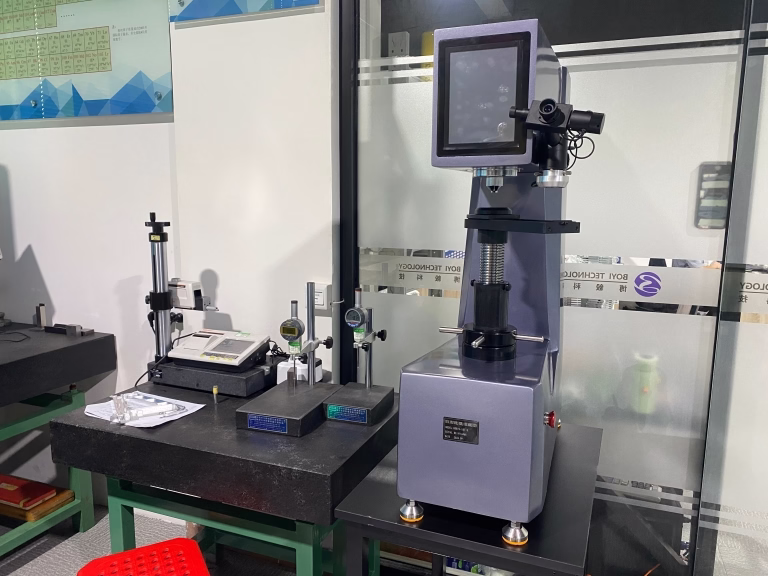 cnc embroidery machine service replacement parts on a machining table