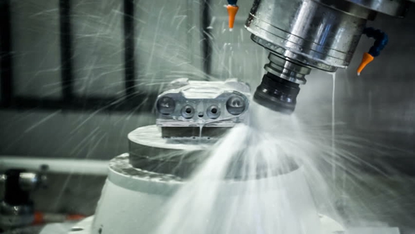 What should be checked before CNC machining