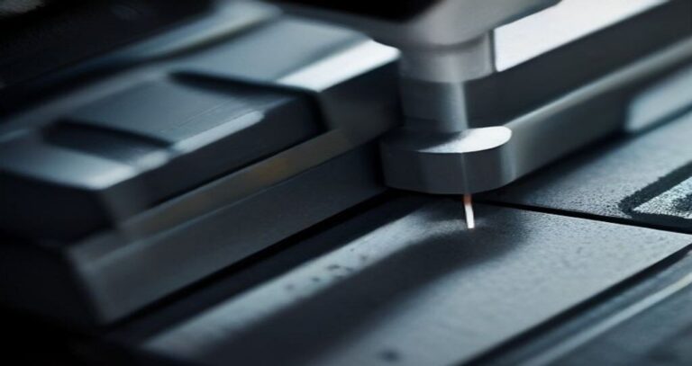 CNC Machine For Acrylic Cutting — Close-up of a router bit cutting a clear acrylic sheet on a CNC bed